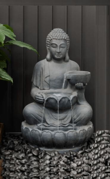 Water fountain showcasing Buddha