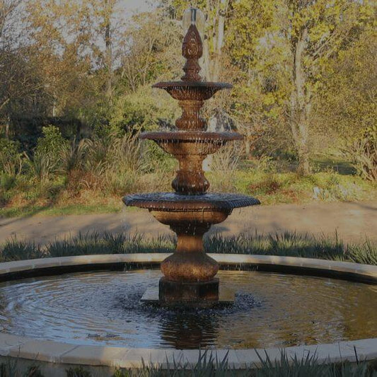 A water fountain crafted from cast iron material